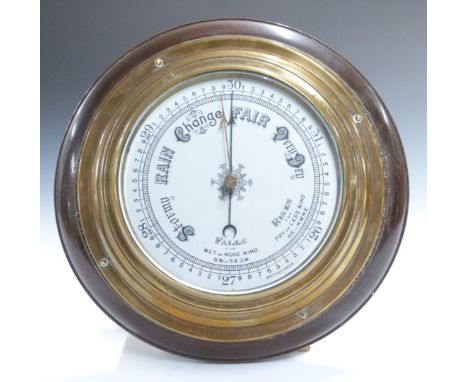 Mid 20thC brass cased aneroid barometer in mahogany surround, 'British Made' to 16cm dial