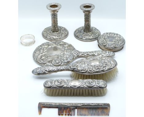 Hallmarked silver mounted dressing table items comprising pair of candlesticks, Birmingham 1984, height 10cm, hand mirror, tw