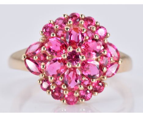 A 9ct gold ring set with pink sapphires in a cluster, 3.3g, size O&nbsp;