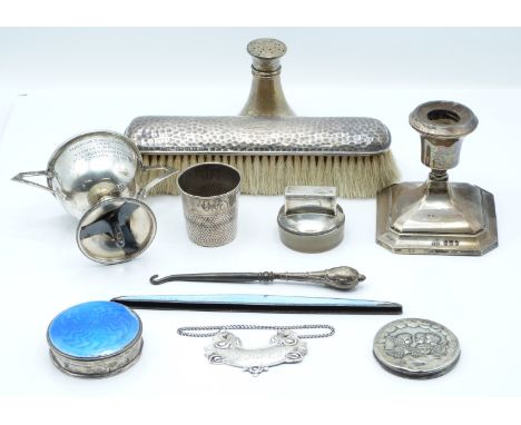 A collection of hallmarked silver items including a candlestick, Birmingham 1927, 1955 silver bowling trophy engraved 'Stanle