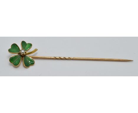 Victorian yellow metal stick pin set with green enamel and a seed pearl in the form of a four leaf clover&nbsp;