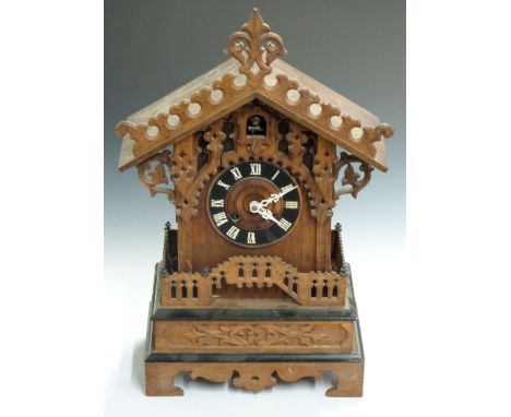 Late 19thC/ early 20thC Black Forest mantel cuckoo clock with pierced gallery decoration and two train unmarked brass movemen
