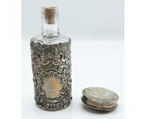 Small hallmarked silver trinket box with embossed decoration of a girl on a swing, diameter 3.5cm, together with an Edward VI
