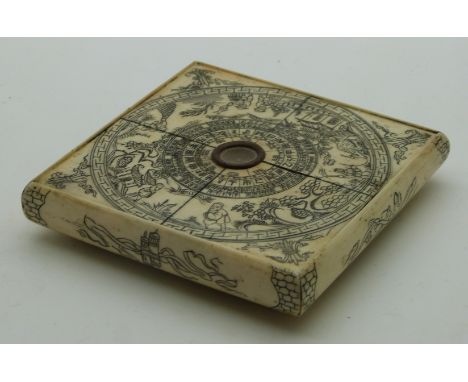 A 19th/20thC bone Chinese Feng Shui compass, 10 x 10cm