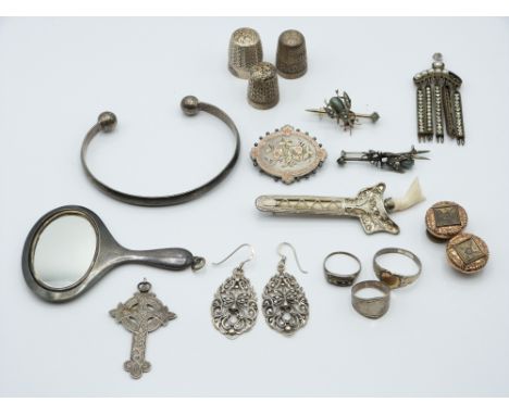 A collection of silver jewellery including rings, pendants, earrings, bangle, Victorian brooch with applied gold detail (Ches
