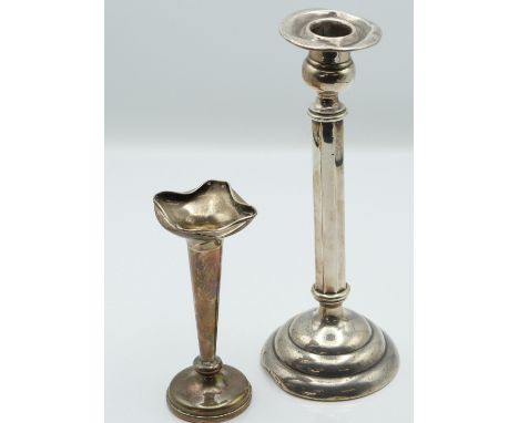 Sterling silver candlestick, height 21cm, and a hallmarked silver vase, Chester 1911, weight of both 249g all in