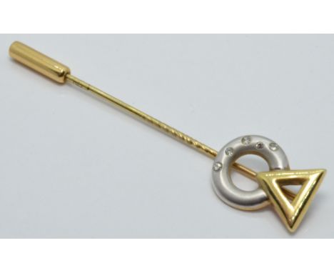 A yellow metal bi-coloured stick pin set with diamonds marked 333, length 5cm, 1.8g