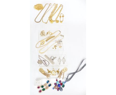 A collection of jewellery including Monet brooches, necklaces, bracelets, Trifari brooch etc