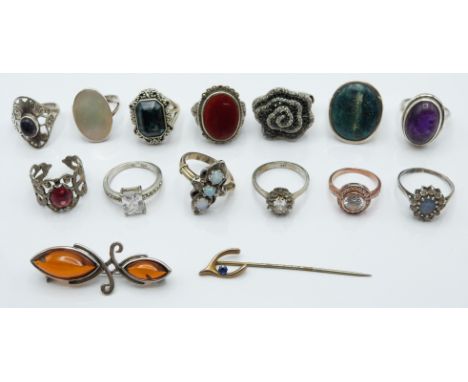 A collection of silver rings set with amethyst, agate, quartz etc and a Victorian stick pin&nbsp;