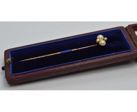 Victorian stick pin set with two split pearls and two diamonds, in original box&nbsp;