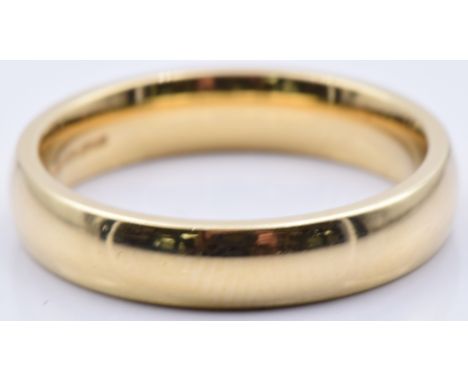 An 18ct gold wedding band/ ring, 5.7g, size L/M&nbsp;