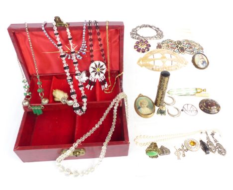 A collection of jewellery including buckles, silver pendants, silver brooches, Art Deco crystal beads, tortoiseshell brooch w