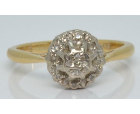An 18ct gold ring set with diamonds in a cluster, 3.7g, size M&nbsp;