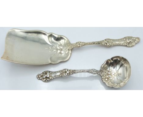 Two Alvin Manufacturing Co. American white metal items, one a serving slice, the other a ladle, both decorated with flowers, 