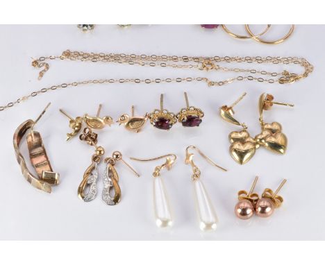 A collection of 9ct gold earrings including ruby, garnet and pearl, 7.4g