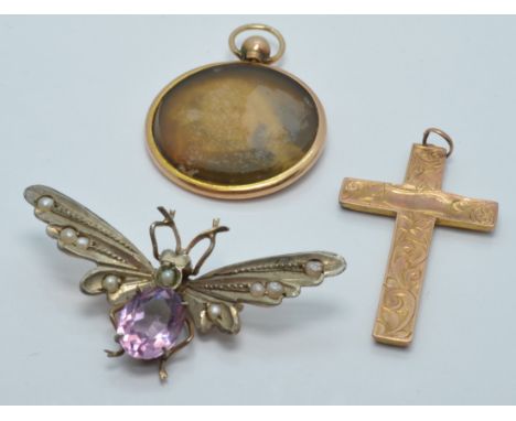 A c1900 silver gilt pin in the form of a butterfly set with amethyst and seed pearls and a 9ct rose gold cross&nbsp;