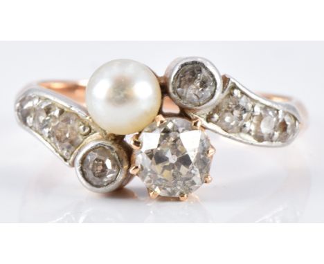 Victorian ring set with a pearl and old cut diamonds, the largest approximately 0.5ct, in a twist setting, 3.8g, size L&nbsp;