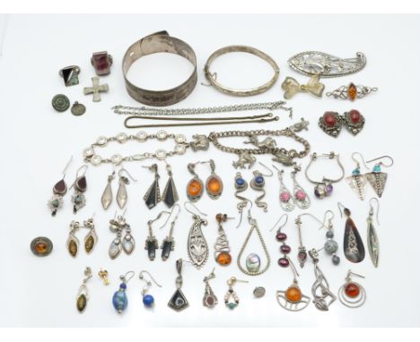 A collection of silver jewellery including silver bangle, silver rings, silver earrings etc, 213g