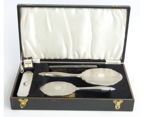 Broadway &amp; Co hallmarked silver mounted dressing table set comprising hand mirror, two brushes and comb in fitted case, B