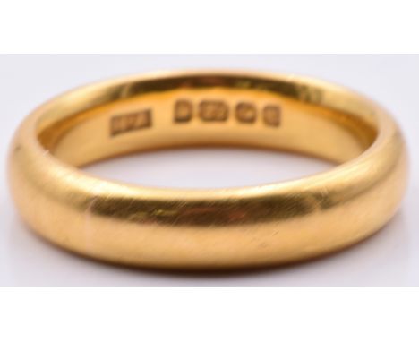 A 22ct gold wedding band/ ring, 7.1g, size K