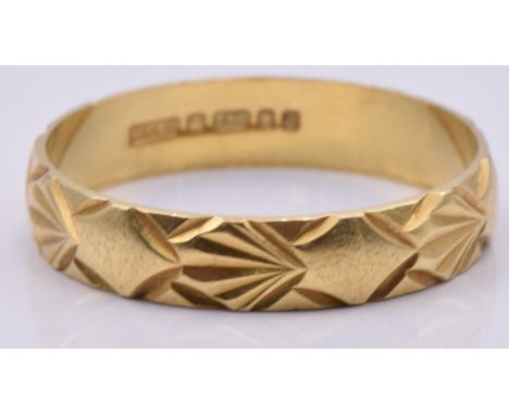 An 18ct gold ring/band, 2.2g, size N/O