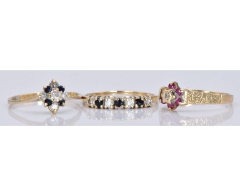 Three 9ct gold rings, one set with cubic zirconia and sapphires, 4.0g, sizes M, N and O&nbsp;