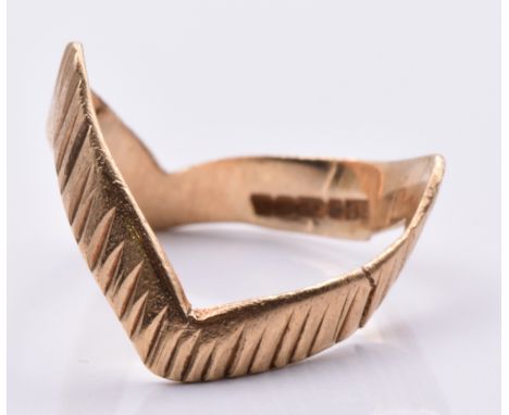 A 9ct gold wishbone ring with ridged decoration, size N, 1.68g&nbsp;