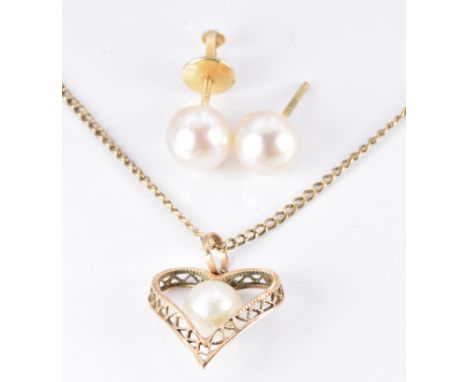 A pair of 14k gold earrings set with a pearl to each and a 9ct gold necklace set with a pearl, 4.5g