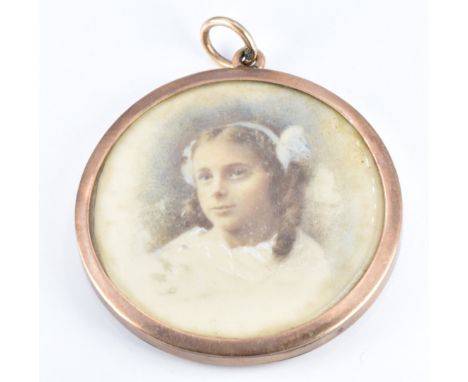 Victorian&nbsp;9ct gold double sided locket set with a portrait miniature to each side depicting a young girl and small child
