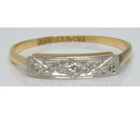 Art Deco 18ct gold ring set with five diamonds in a platinum setting, 1.3g, size K