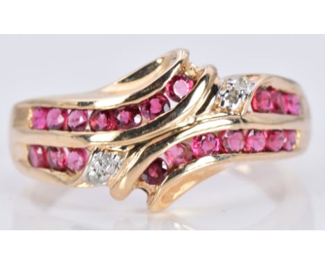 A 9ct gold ring set with rubies and diamonds, 3.1g, size O