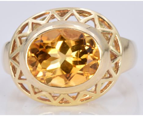 A 14ct gold ring set with a citrine in a geometric mount, 5.5g, size L&nbsp;