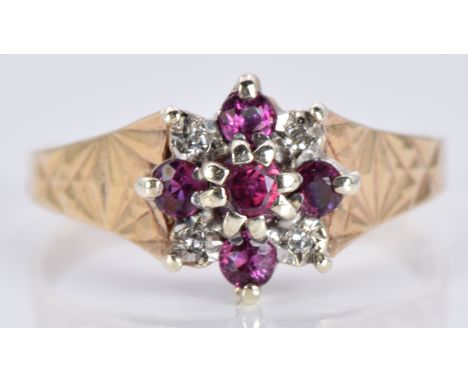 A 9ct gold ring set with diamonds and rubies, 2.7g, size K/L