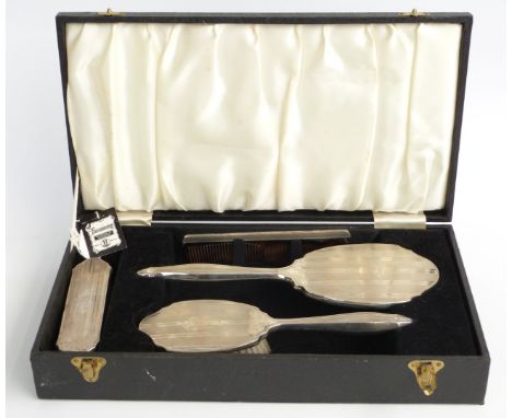 Broadway & Co hallmarked silver mounted dressing table set comprising hand mirror, two brushes and comb in fitted case, Birmi