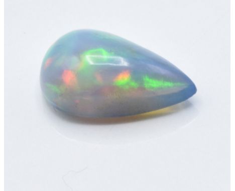 A 3.55ct pear cut black opal cabochon