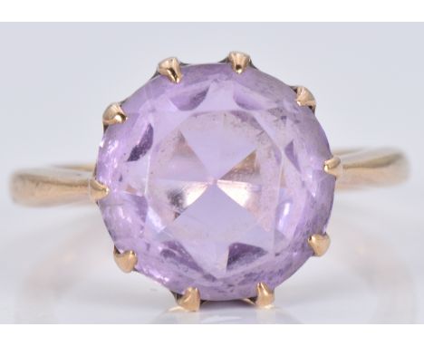 A 9ct gold ring set with a round cut amethyst, 3.3g, size H/I