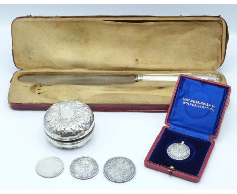 White metal mounted yo-yo marked Sterling, Regents Park Football Association hallmarked silver medal, three Victorian silver 