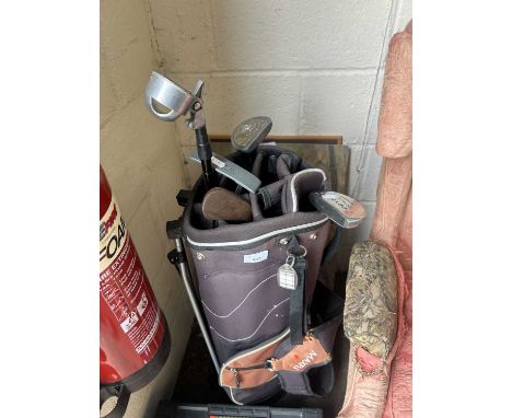 Golf caddy and clubs