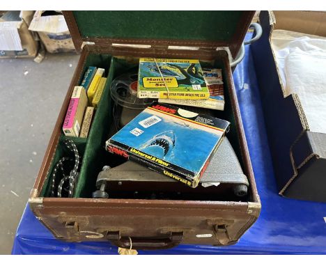 Vintage Specto projector and various films