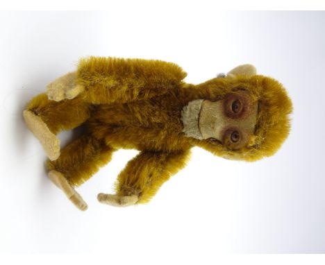 Small Schucco brown plush covered monkey the head removing to reveal a scent flask, H11cm  Condition Report & Further Details