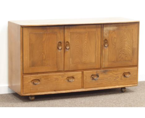 Ercol elm sideboard, three cupboards and two drawers, W130cm, H76cm, D49cm Condition Report & Further Details Click here for 