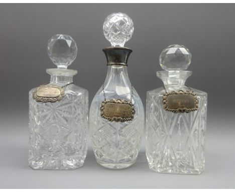 Cut crystal decanter with silver mount and two other crystal decanters, all with hallmarked silver drinks labels (6) Conditio