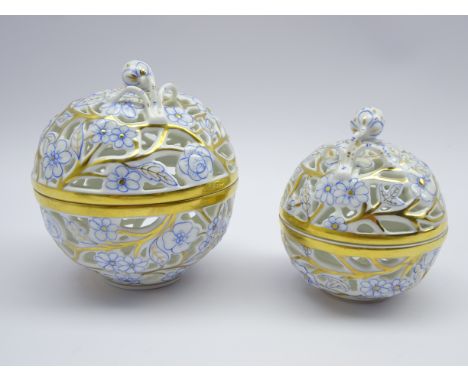 Pair graduating Herend reticulated trinket jars decorated with roses and other flowers with strawberry knop, no. 6214 & 6213/