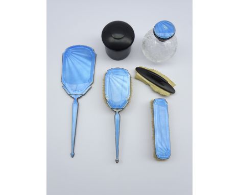 Etched glass globe scent flask with silver and blue enamel cover Birmingham 1931 and a similar 3 piece dressing table set, 19