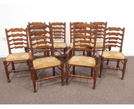 Set eight (6+2) stained beech country style ladder back dining chairs, rush seats, turned supports and stretchers  Condition 