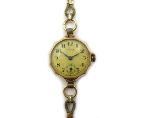 Rolex 9ct rose gold ladies wristwatch, engine turned dial, hallmarked, on rolled gold strap  Condition Report & Further Detai