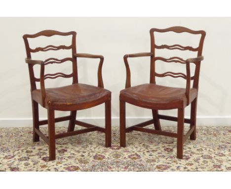 Pair of Georgian mahogany elbow chairs, waved pierced ladder backs, dished seats upholstered in leather, inner chambered squa