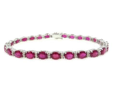 Ruby and diamond 18ct white gold line bracelet, stamped 750, rubies approx 13.3 carat, diamonds approx 0.7 carat Condition Re