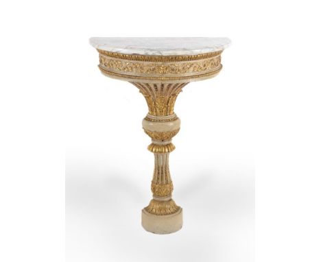 A Continental, possibly Baltic, parcel gilt, painted and marble topped console table, late 18th/early 19th century, the demi 