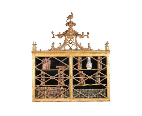 A George III carved giltwood and gesso hanging wall cabinet, circa 1780, in the manner of Thomas Chippendale, the carved and 